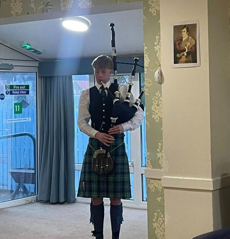 luke playing bagpipes