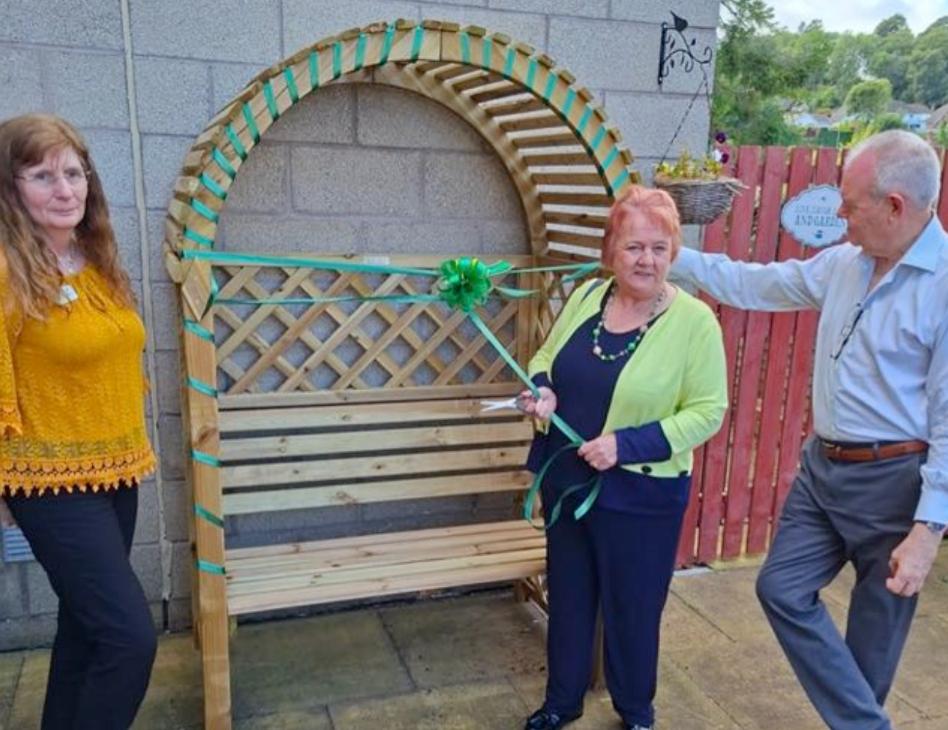 staff and family at the bench